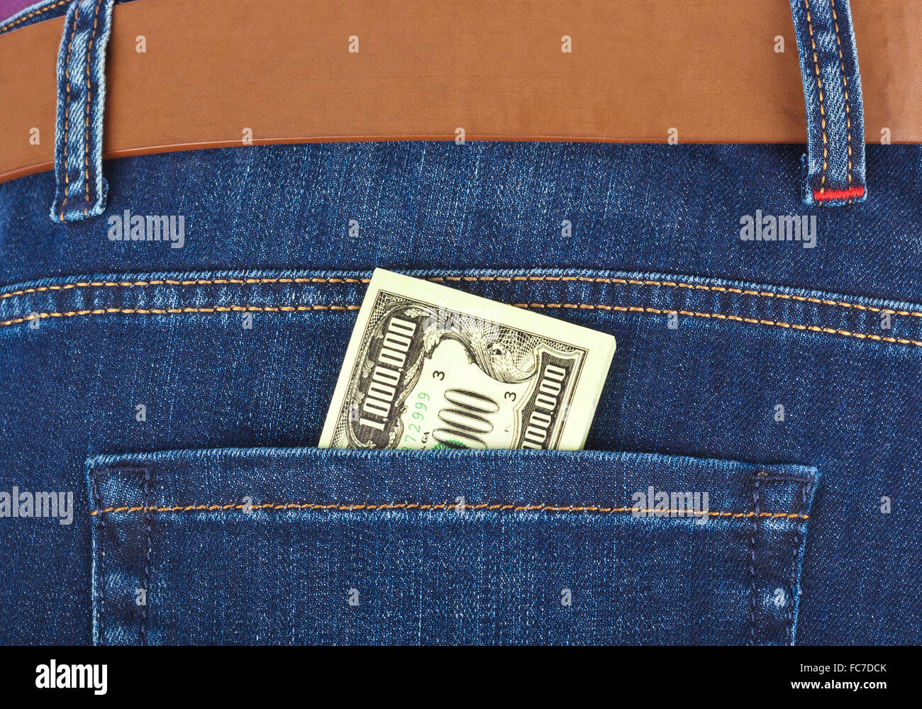Money in jeans pocket Stock Photo Alamy