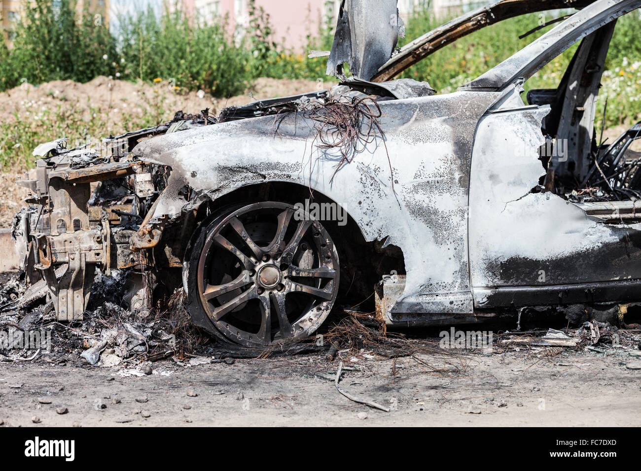 Arson fire burnt wheel car vehicle junk Stock Photo Alamy