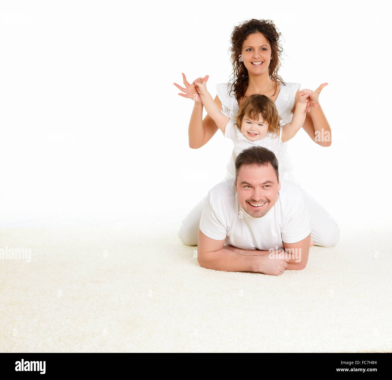 Same Father portrait of mother, father and their child together in studio Stock ...