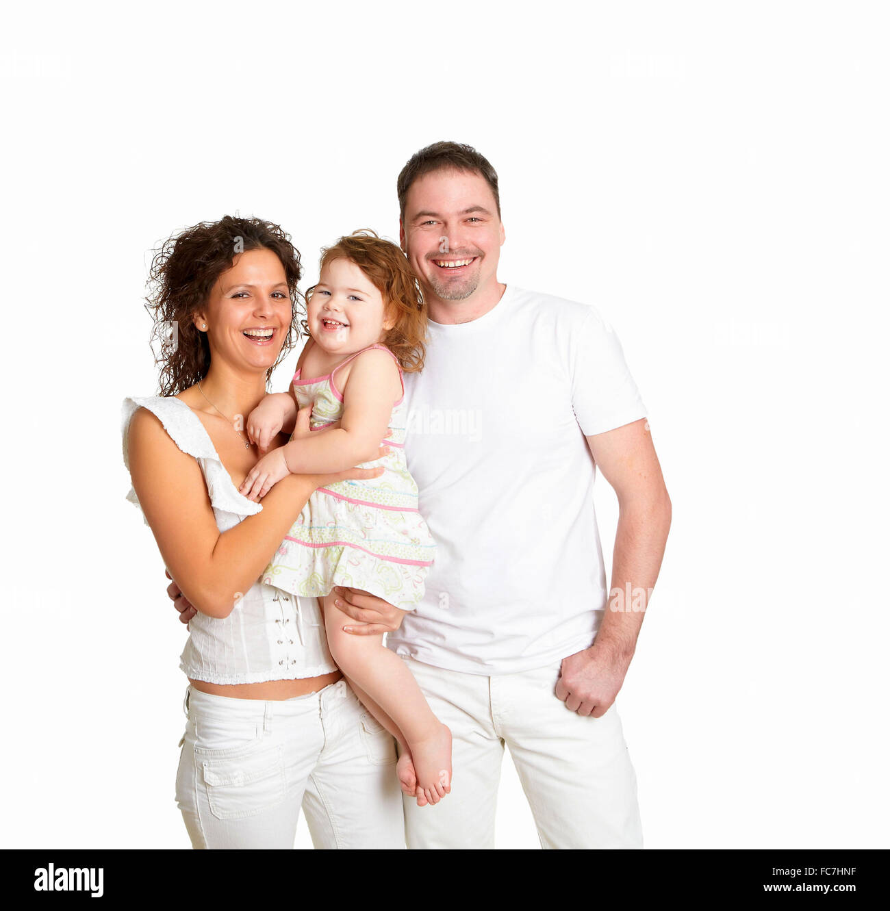 Same Father portrait of mother, father and their child together in studio Stock ...