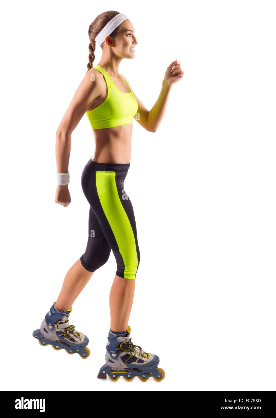 Sporty young girl on roller skates isolated Stock Photo - Alamy