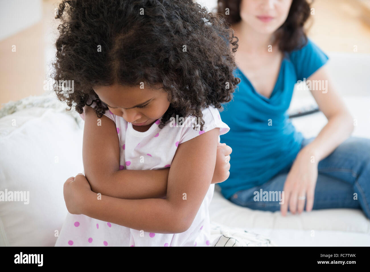 Frustrated girl ignoring mother Stock Photo