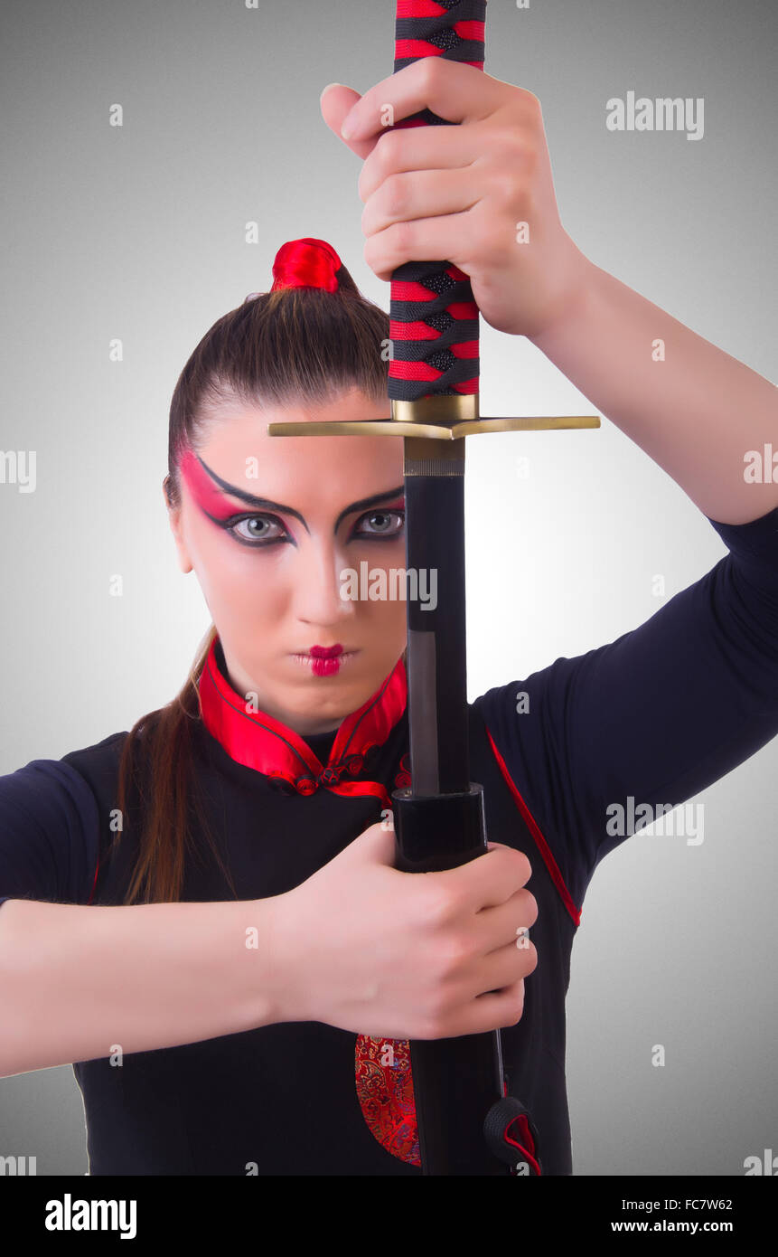Woman in japanese martial art concept Stock Photo Alamy