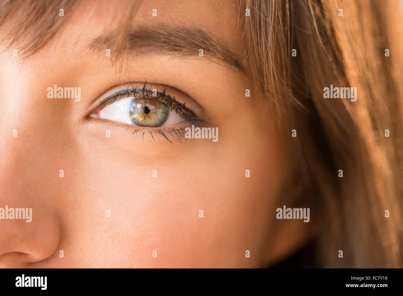 Close up of eye of mixed race woman Stock Photo