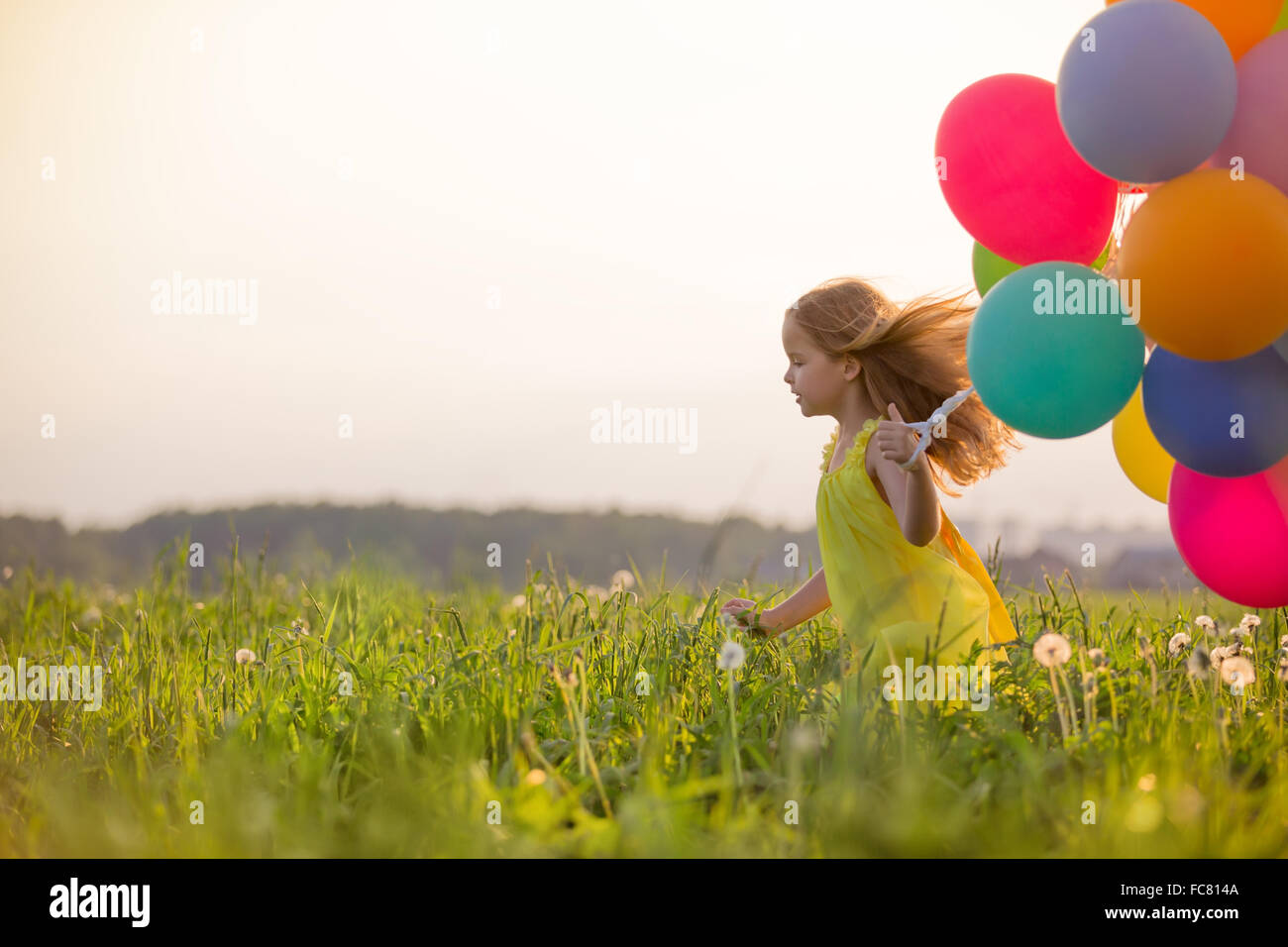 Balloon running hi-res stock photography and images - Alamy
