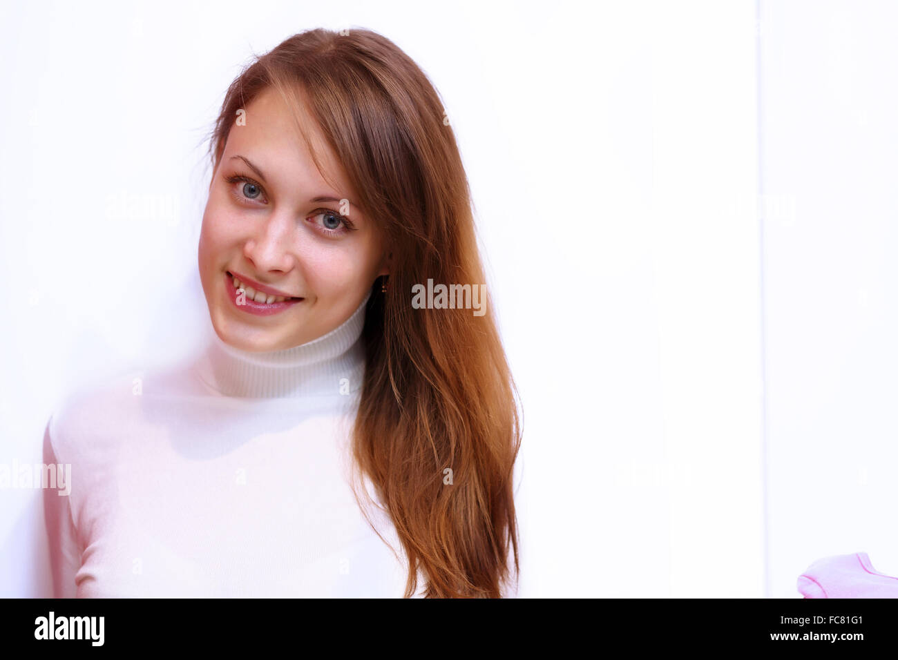 Portrait of young woman inside a store buying clothes Stock Photo - Alamy