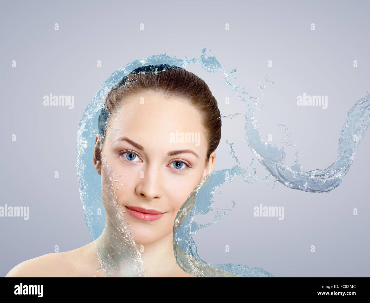 Portrait of beautiful young woman with water splashes Stock Photo - Alamy