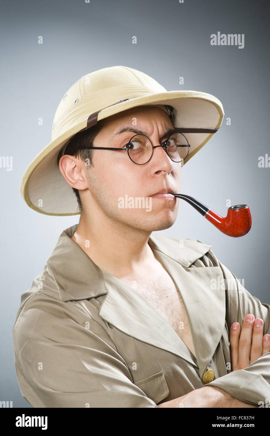 Man wearing safari hat in funny concept Stock Photo - Alamy
