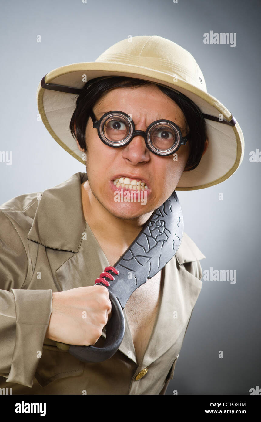 Man wearing safari hat in funny concept Stock Photo - Alamy