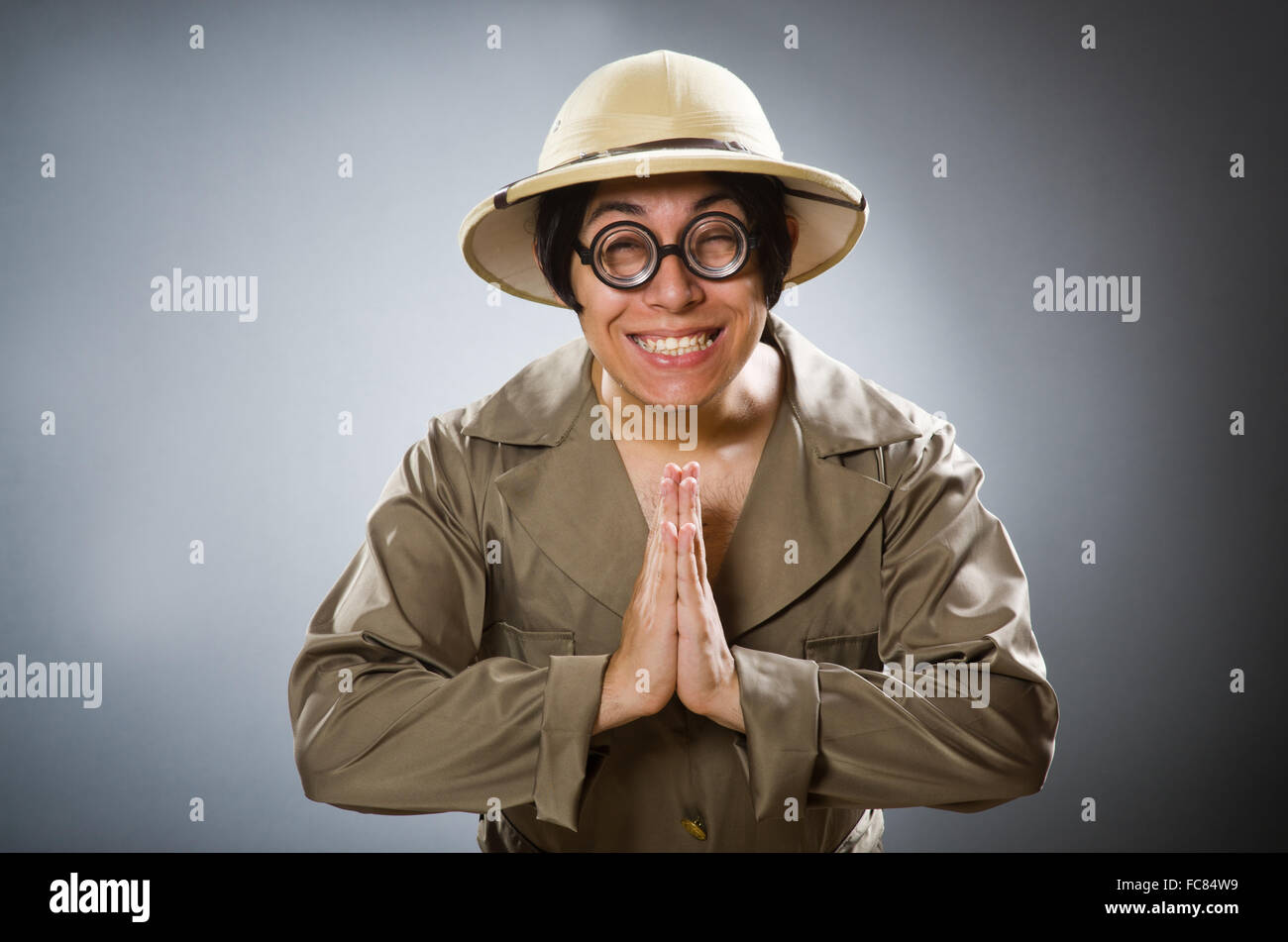 Man wearing safari hat in funny concept Stock Photo - Alamy