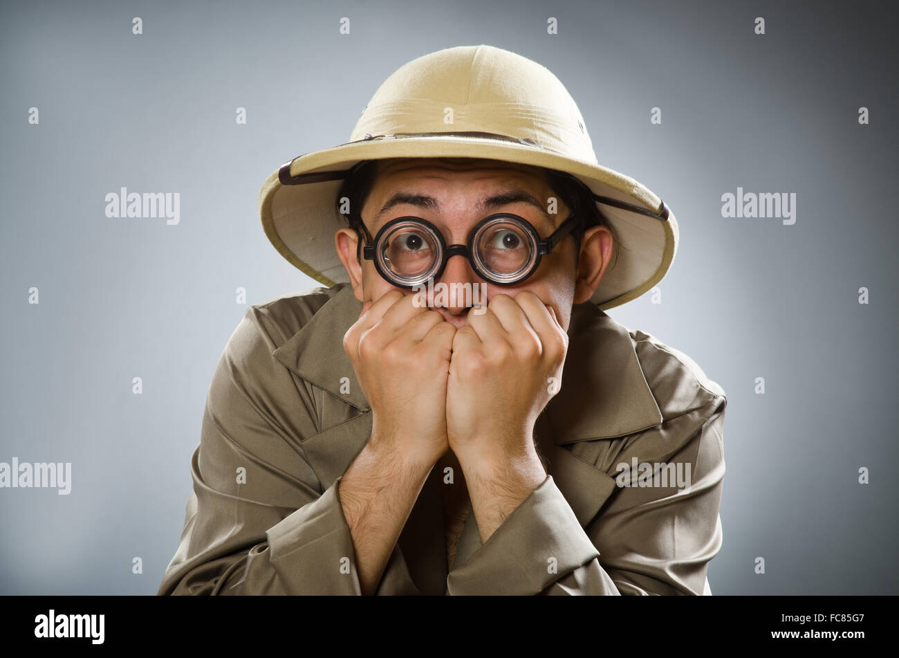 Man wearing safari hat in funny concept Stock Photo - Alamy