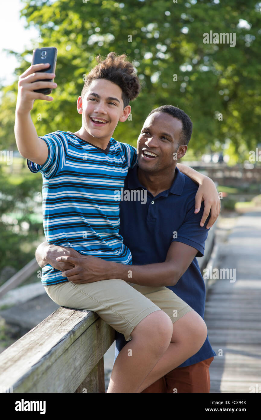 Father photographing son hi-res stock photography and images - Alamy