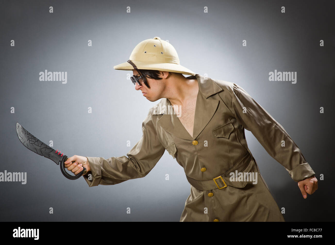 Man wearing safari hat in funny concept Stock Photo - Alamy