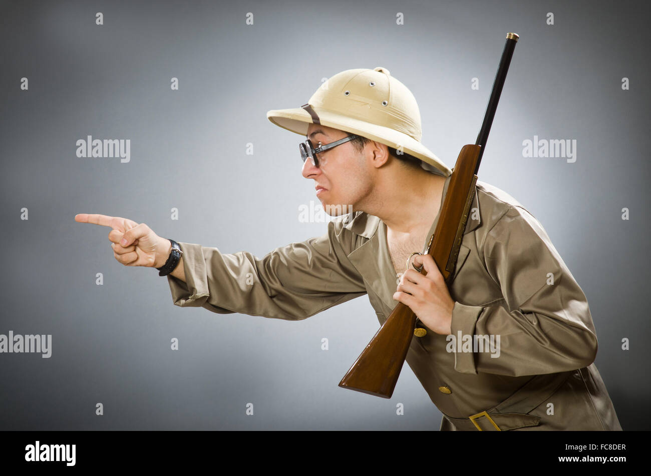 Man wearing safari hat in funny concept Stock Photo - Alamy