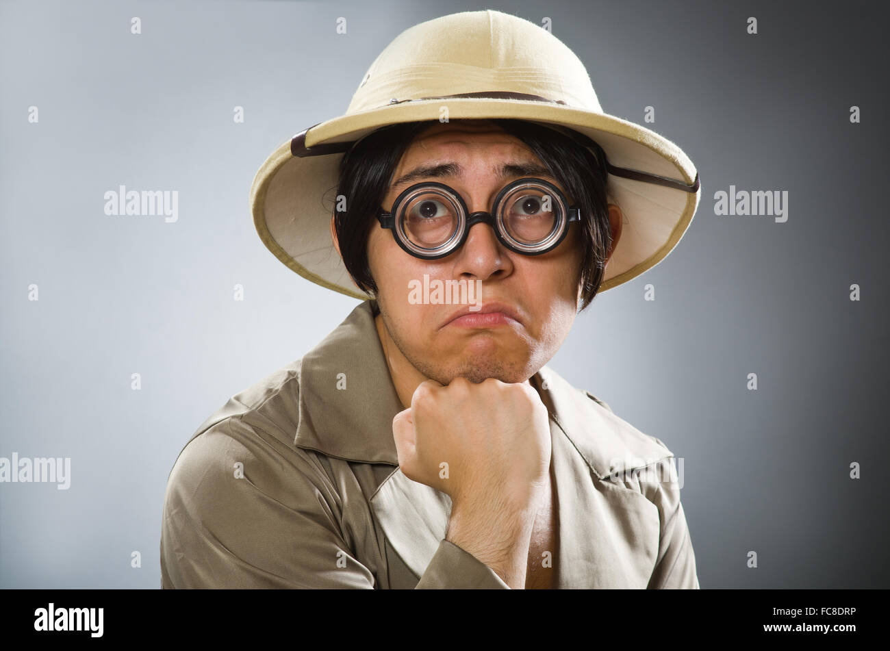 Man wearing safari hat in funny concept Stock Photo - Alamy