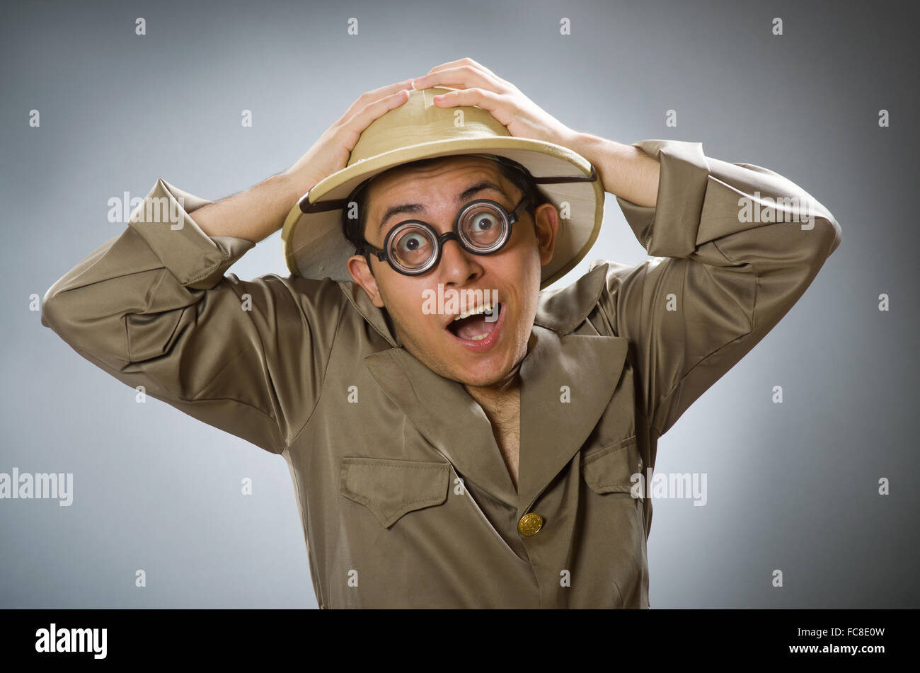 Man wearing safari hat in funny concept Stock Photo - Alamy