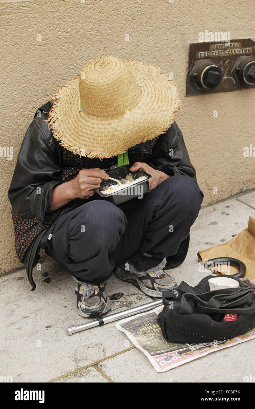 Chinese homeless woman Stock Photo