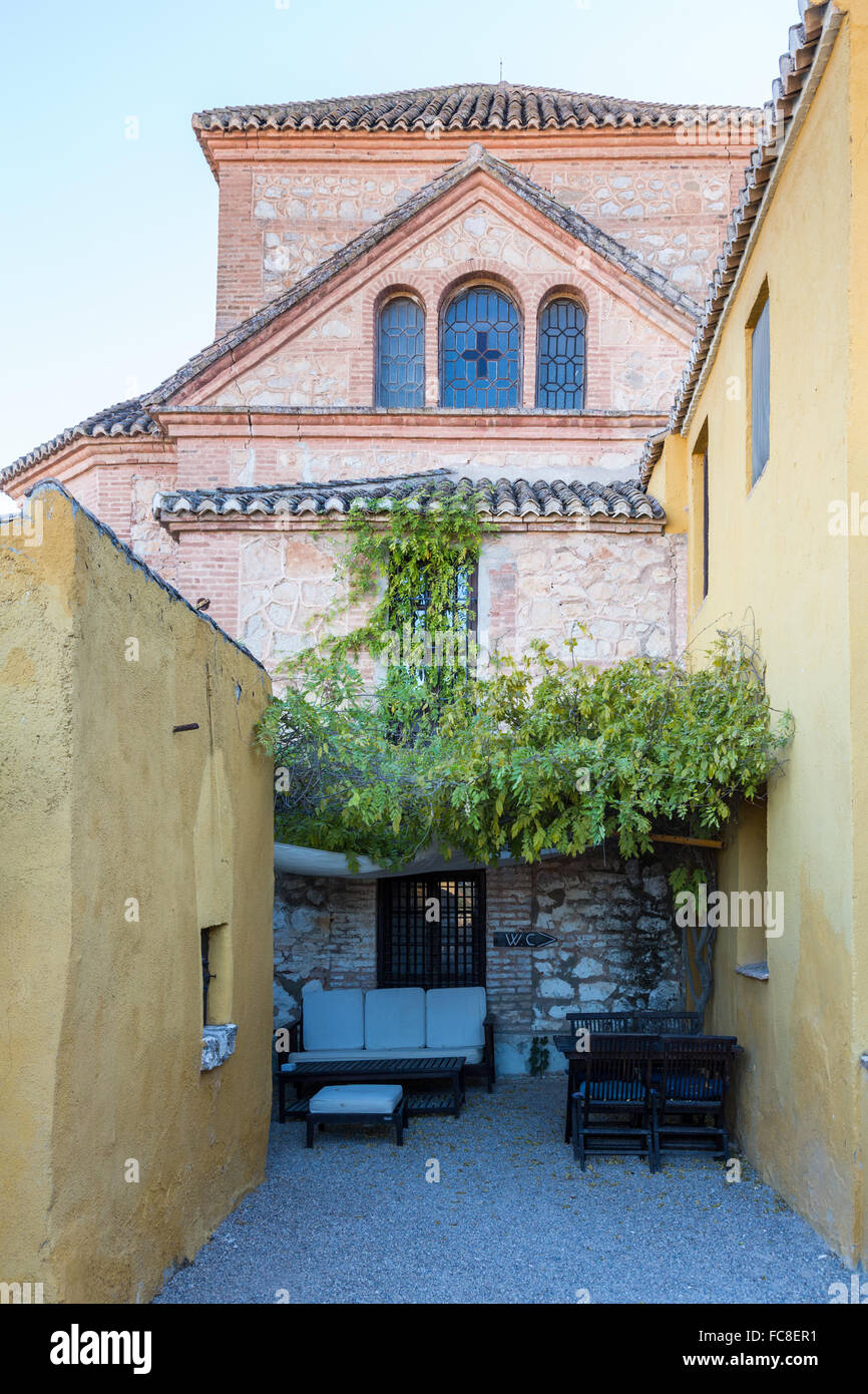 Warm courtyard with tables and chairs Spain Stock Photo