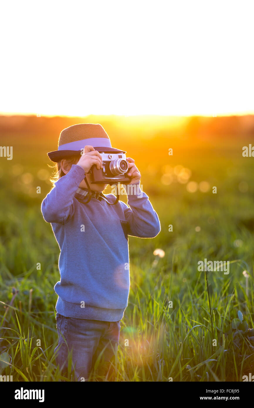 Boy with camera Stock Photo - Alamy