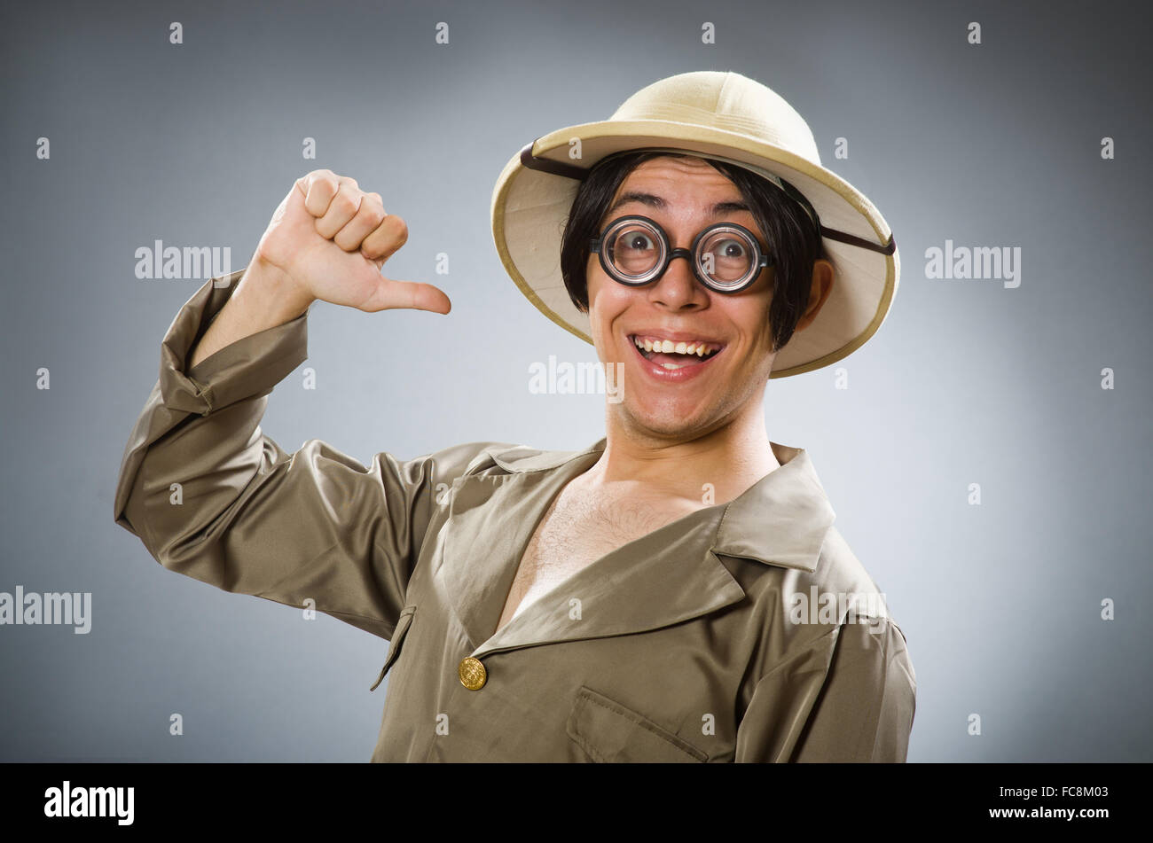 Man wearing safari hat in funny concept Stock Photo - Alamy