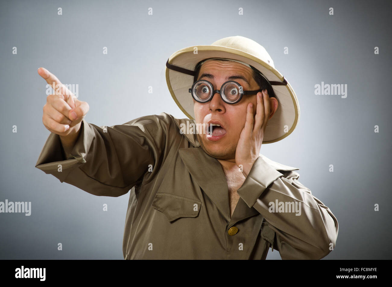 Man wearing safari hat in funny concept Stock Photo - Alamy