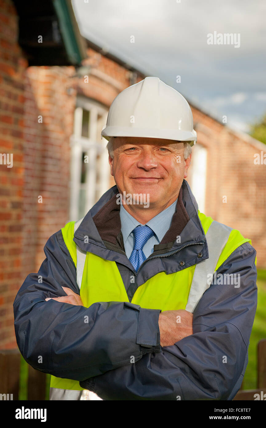 Wearing safety helmet jacket hires stock photography and images Alamy