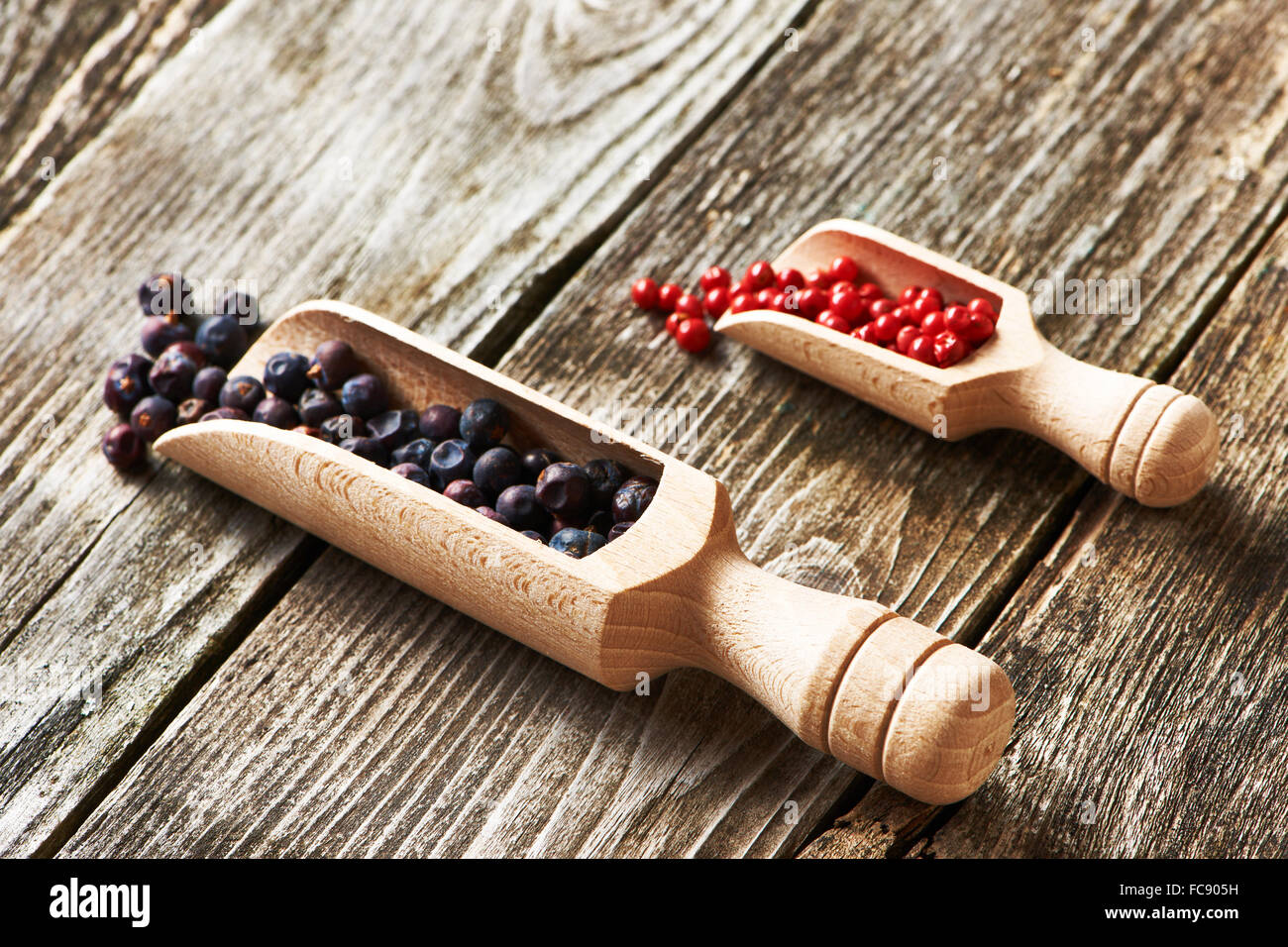 Juniper berries and rose pepper Stock Photo Alamy