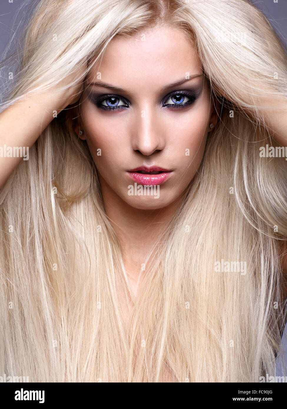 Blonde young woman Stock Photo - Alamy