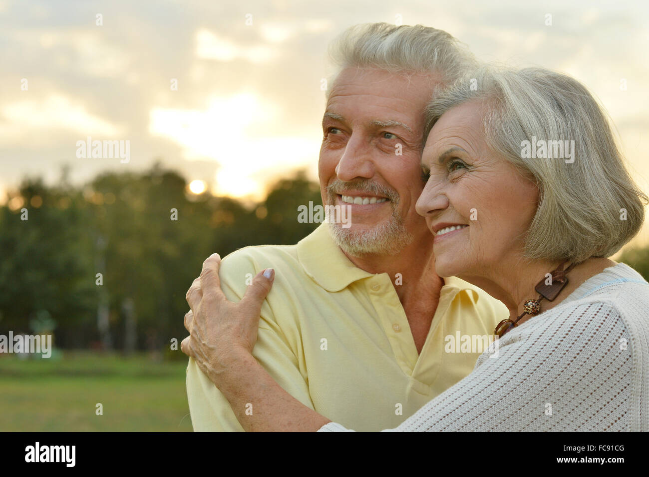 Senior couple in summer park Stock Photo - Alamy