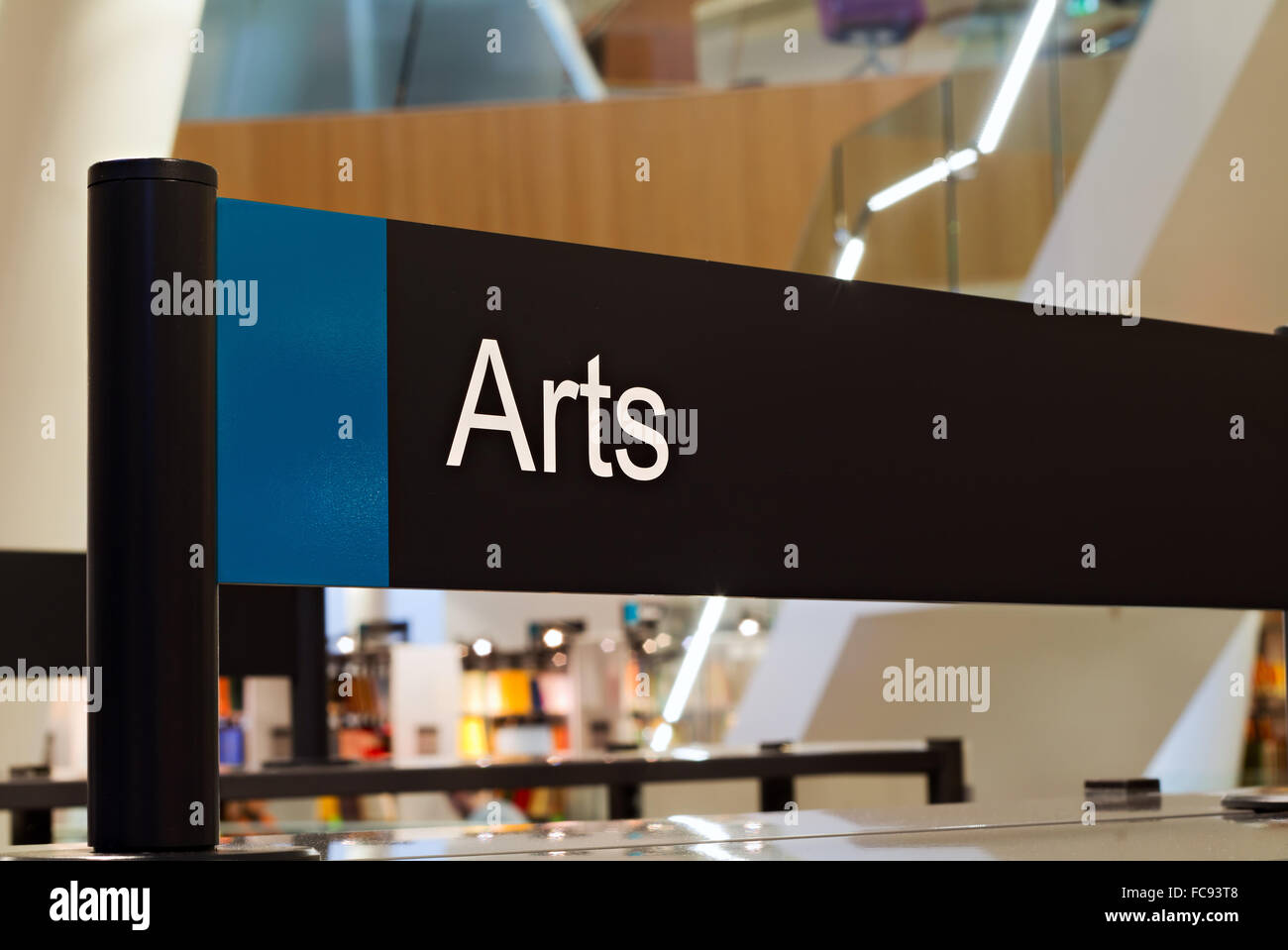 Arts section sign inside a modern public library Stock Photo - Alamy