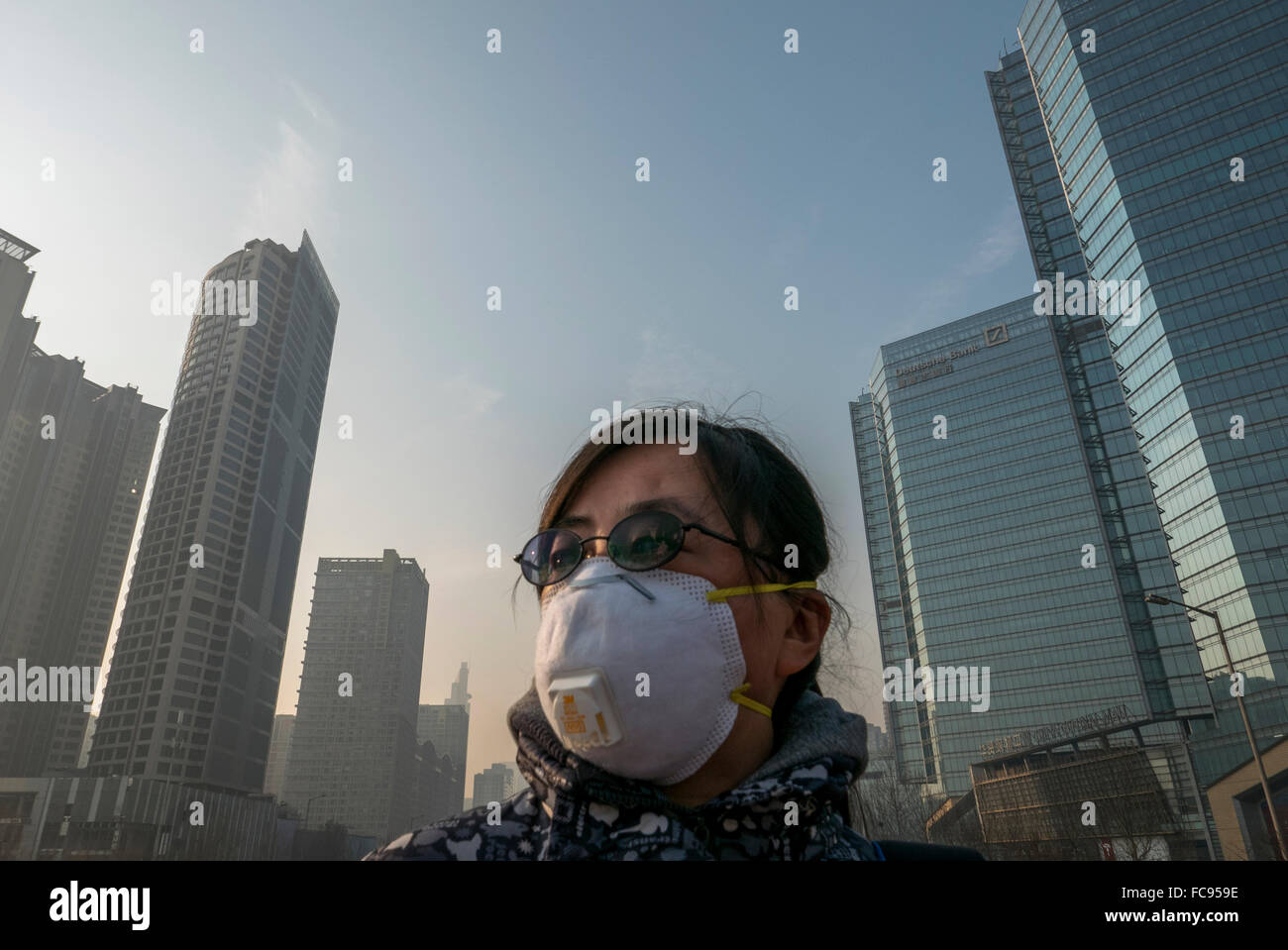 girl wearing mask in a hazy day Stock Photo Alamy