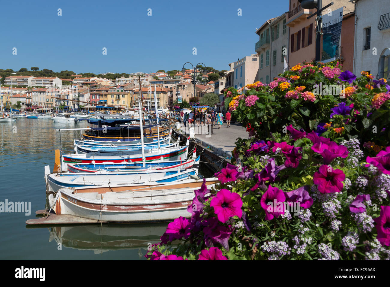 Traditional fishing boats moored in the harbour of the historic town of Cassis, Cote d'Azur, Provence, France, Mediterranean Stock Photo