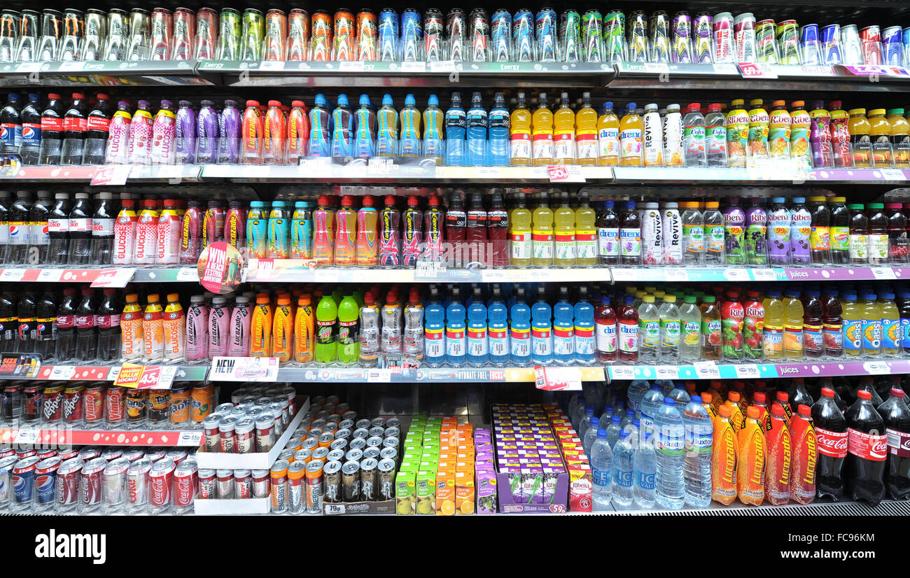 Fizzy carbonated soft drinks for sale in a shop. Sugary fizzy drinks