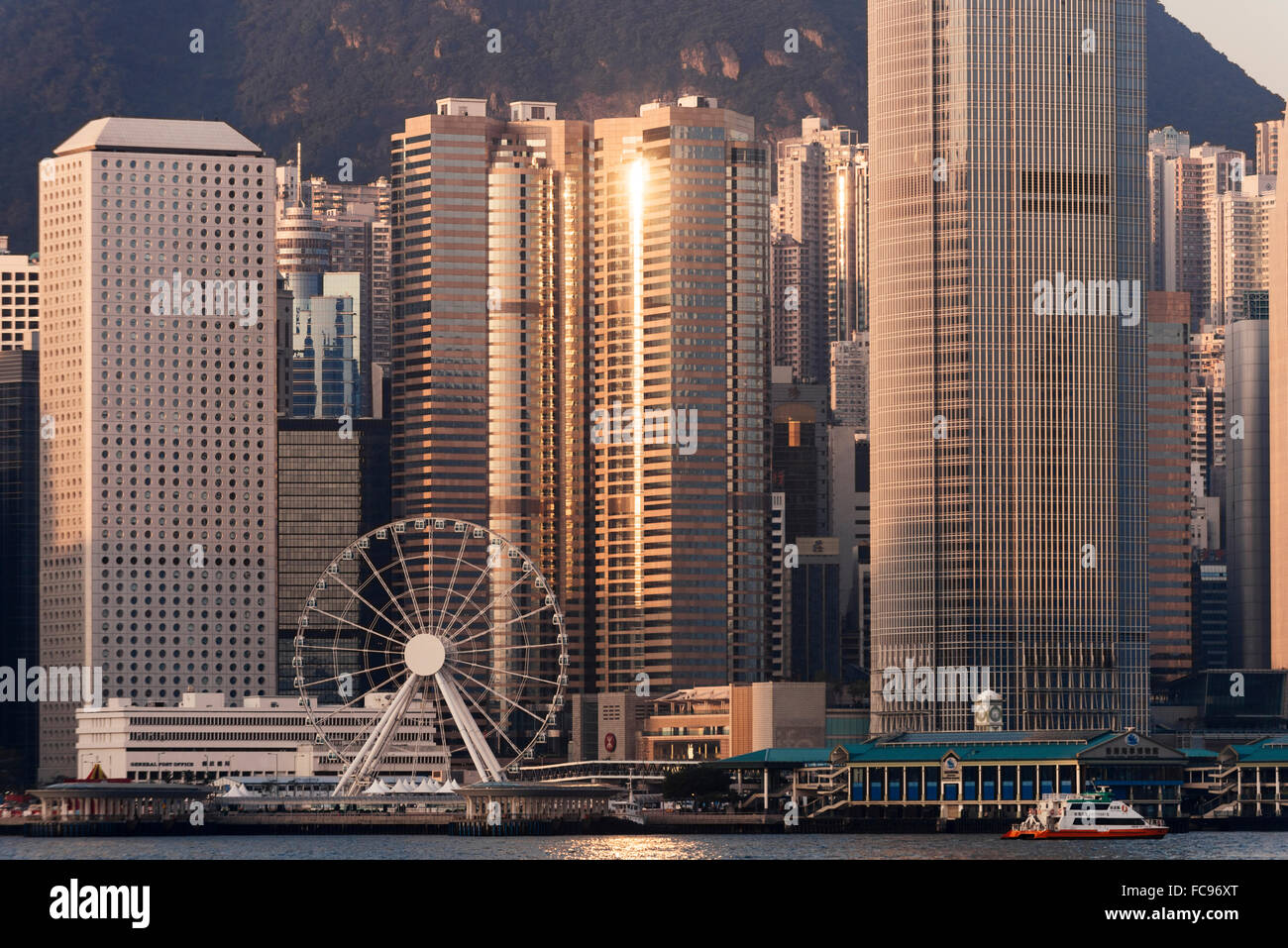Dawn over Hong Kong Central skyline, Avenue of Stars, Tsim Sha Tsui Waterfront, Kowloon, Hong Kong, China, Asia Stock Photo