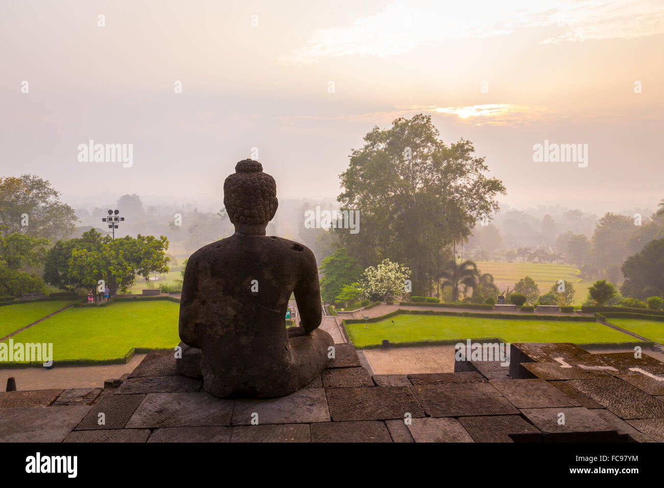 Buddha statue overlooking landscape. Indonesia. Borobudur is the