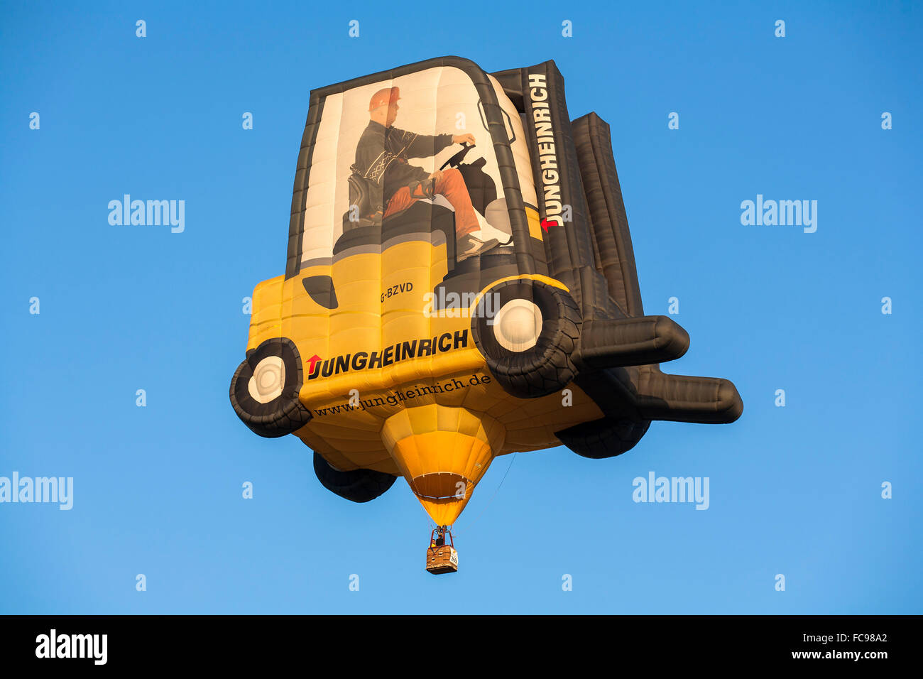 DEU, Germany, Sauerland region, Warstein, international balloon festival in Warstein, balloon in the shape of a fork lift truck  Stock Photo