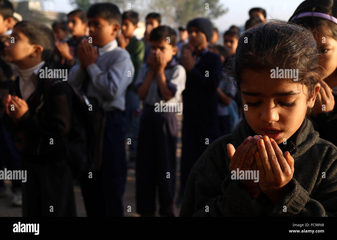 Pakistan R Bacha Karachi. 21st Jan, 2016. Pakistani students pray for victims of the ...