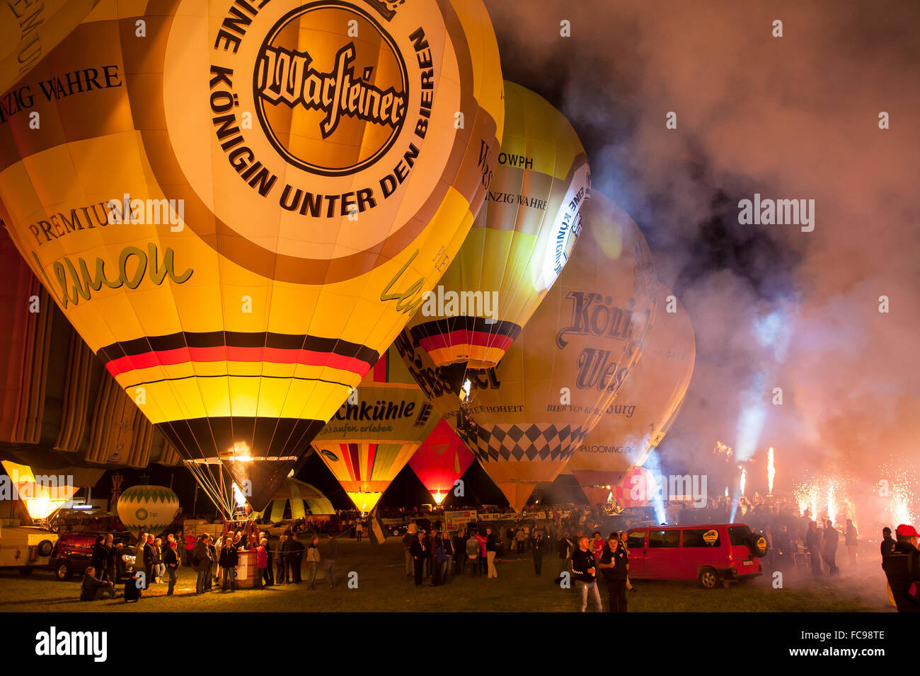 DEU, Germany, Sauerland region, Warstein, international balloon festival in Warstein, balloons during the night glow [the balloo Stock Photo
