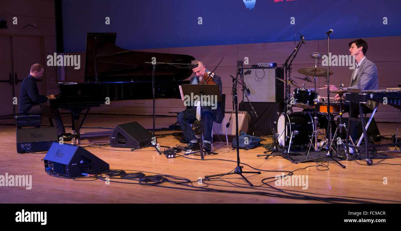 NEW YORK, NY - JANUARY 15, 2016: Ches Smith trio performs as part of New York City Winter Jazz Festival at the New School Tishman Auditorium sponsored by ECM Stock Photo