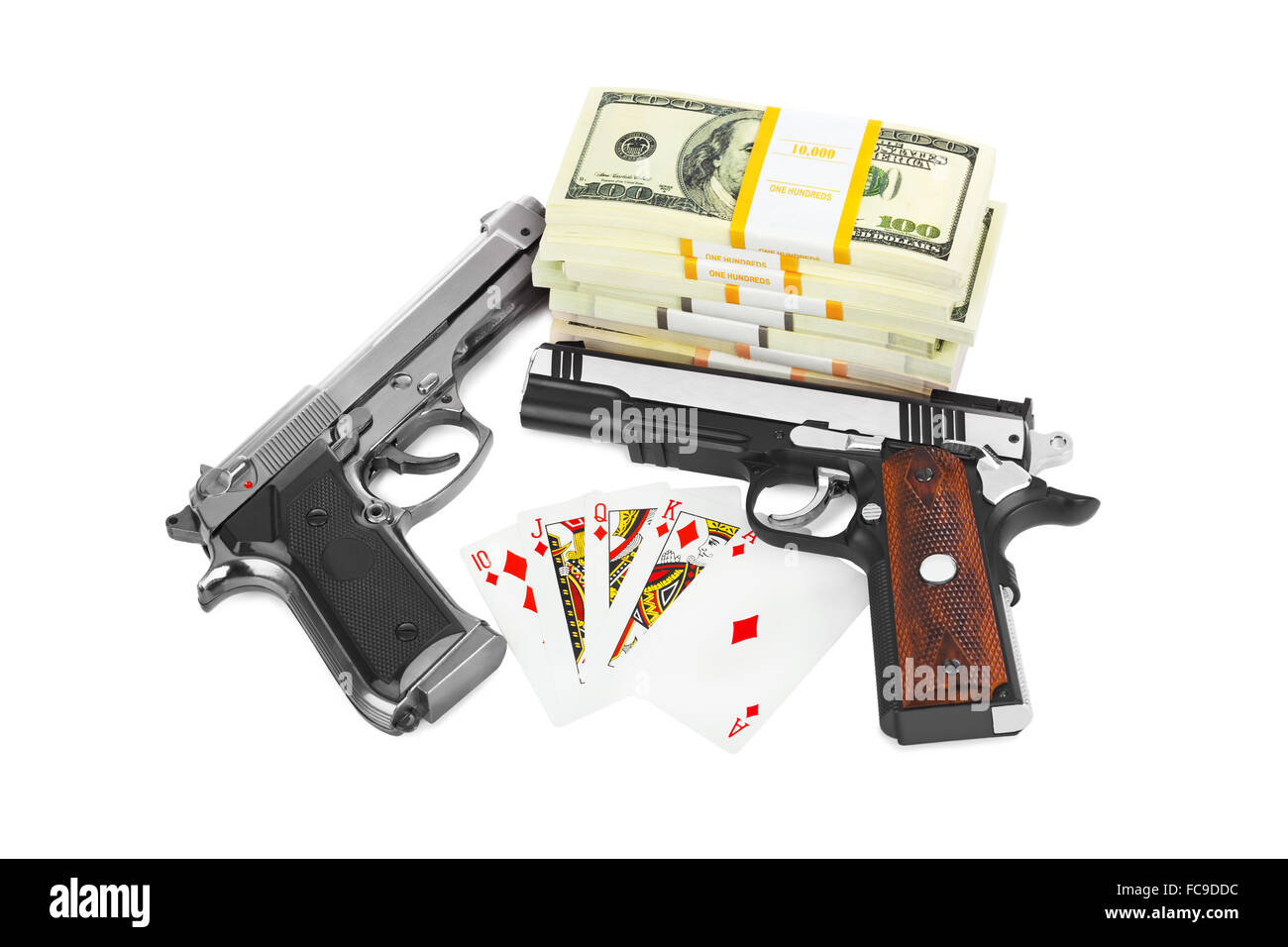 Guns money and playing cards Stock Photo