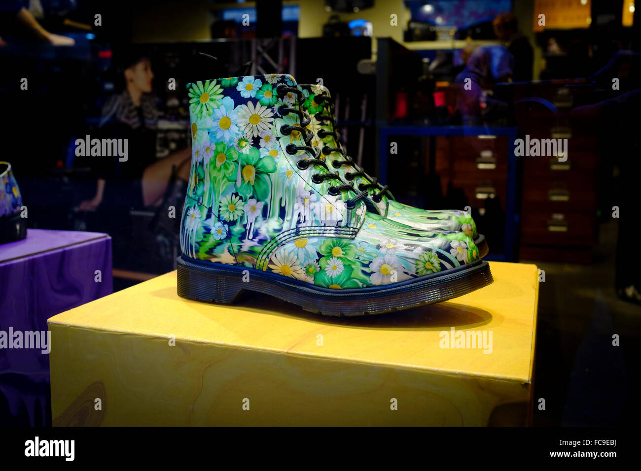 Dr Martens floral design boots on display at Dr Martens shop, Neal street, Covent Garden, London.UK. Stock Photo