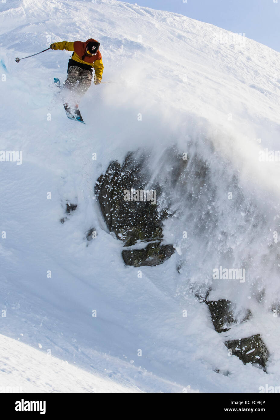 Skier airing cliff Stock Photo