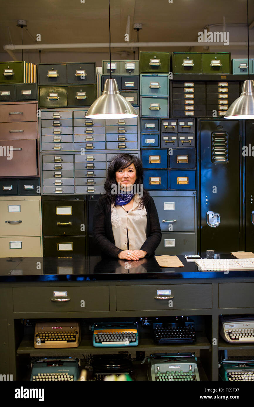A portrait of a woman at a card and stationary shop in Vancouver, BC