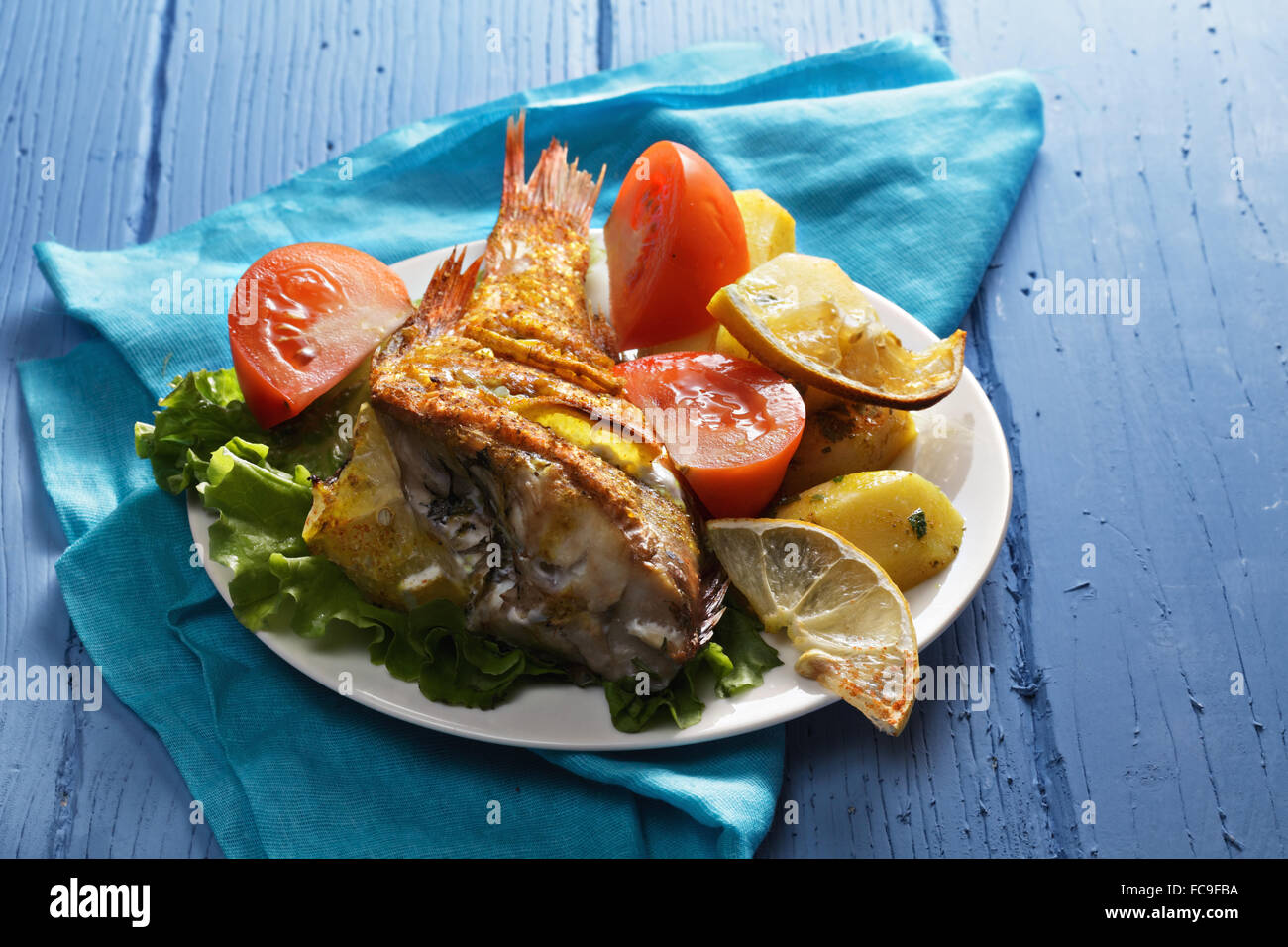 Oven baked rockfish Stock Photo Alamy