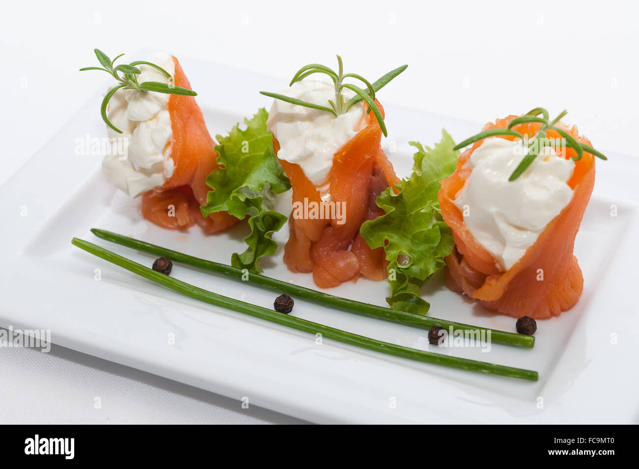 Canapes with smoked salmon with cream cheese Stock Photo Alamy