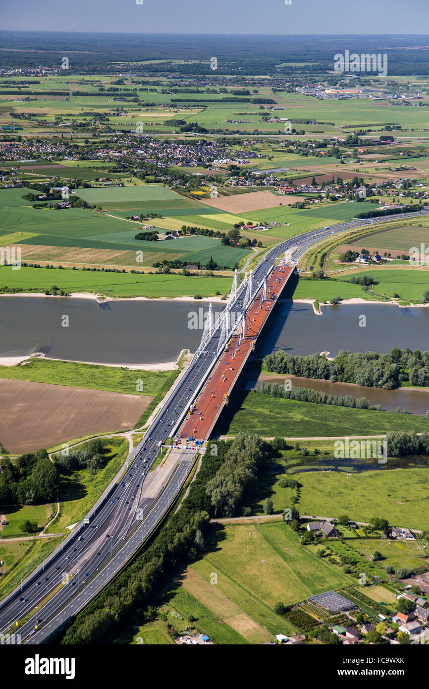 Netherlands, Ewijk, Bridge over Waal river, A50 highway Stock Photo