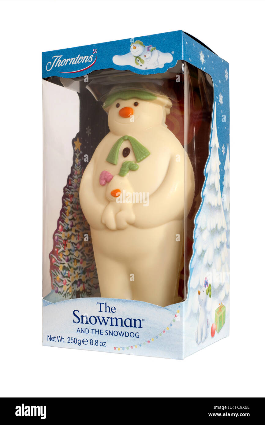white chocolate snowman and the snowdog figurine Stock Photo