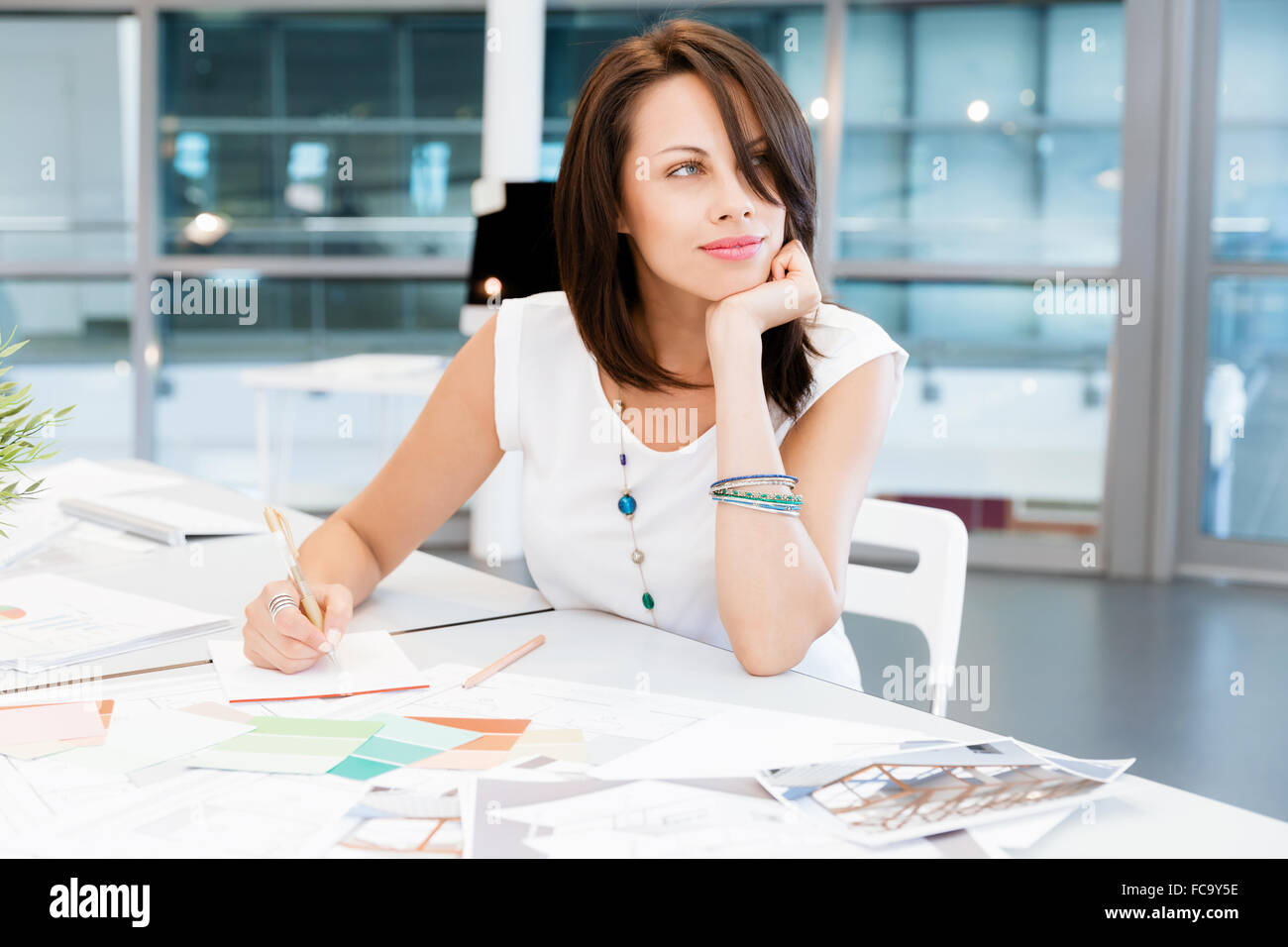 Modern business woman in the office Stock Photo - Alamy