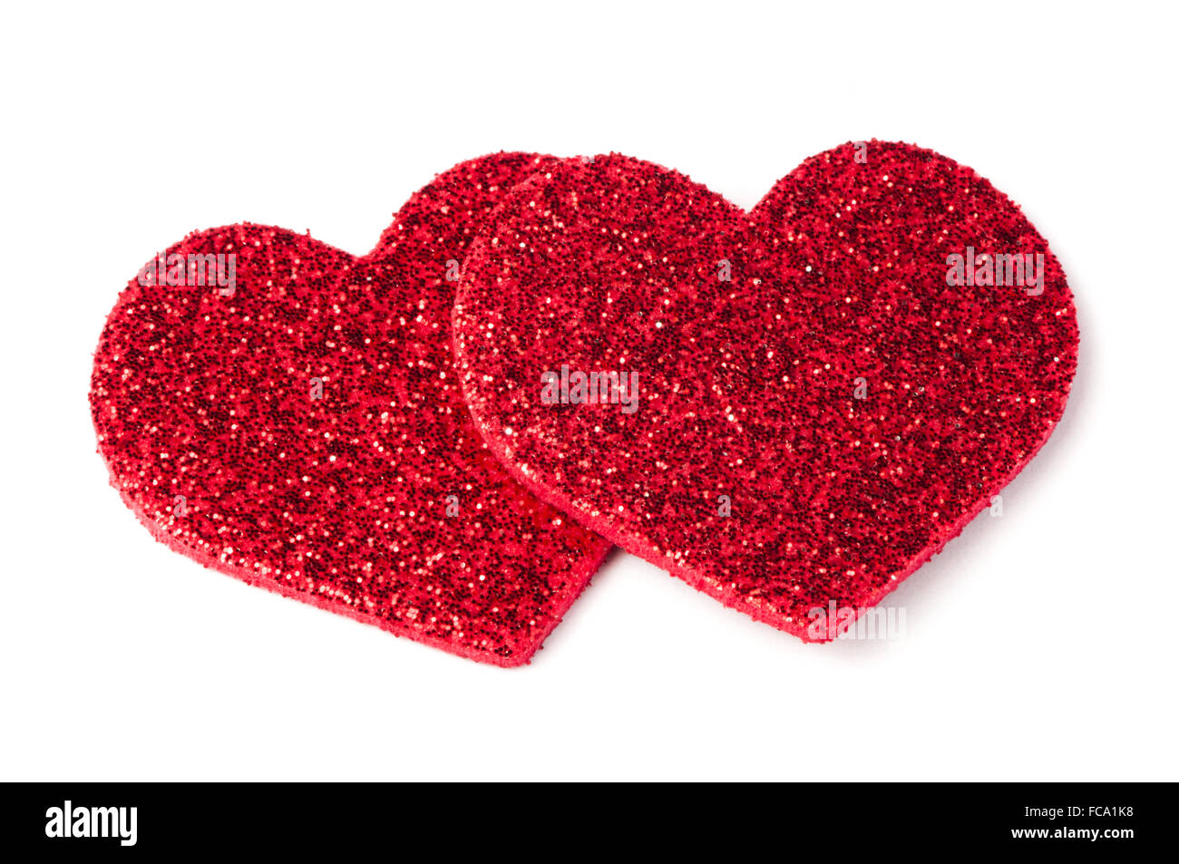 Red shiny hearts on white background Stock Photo - Alamy