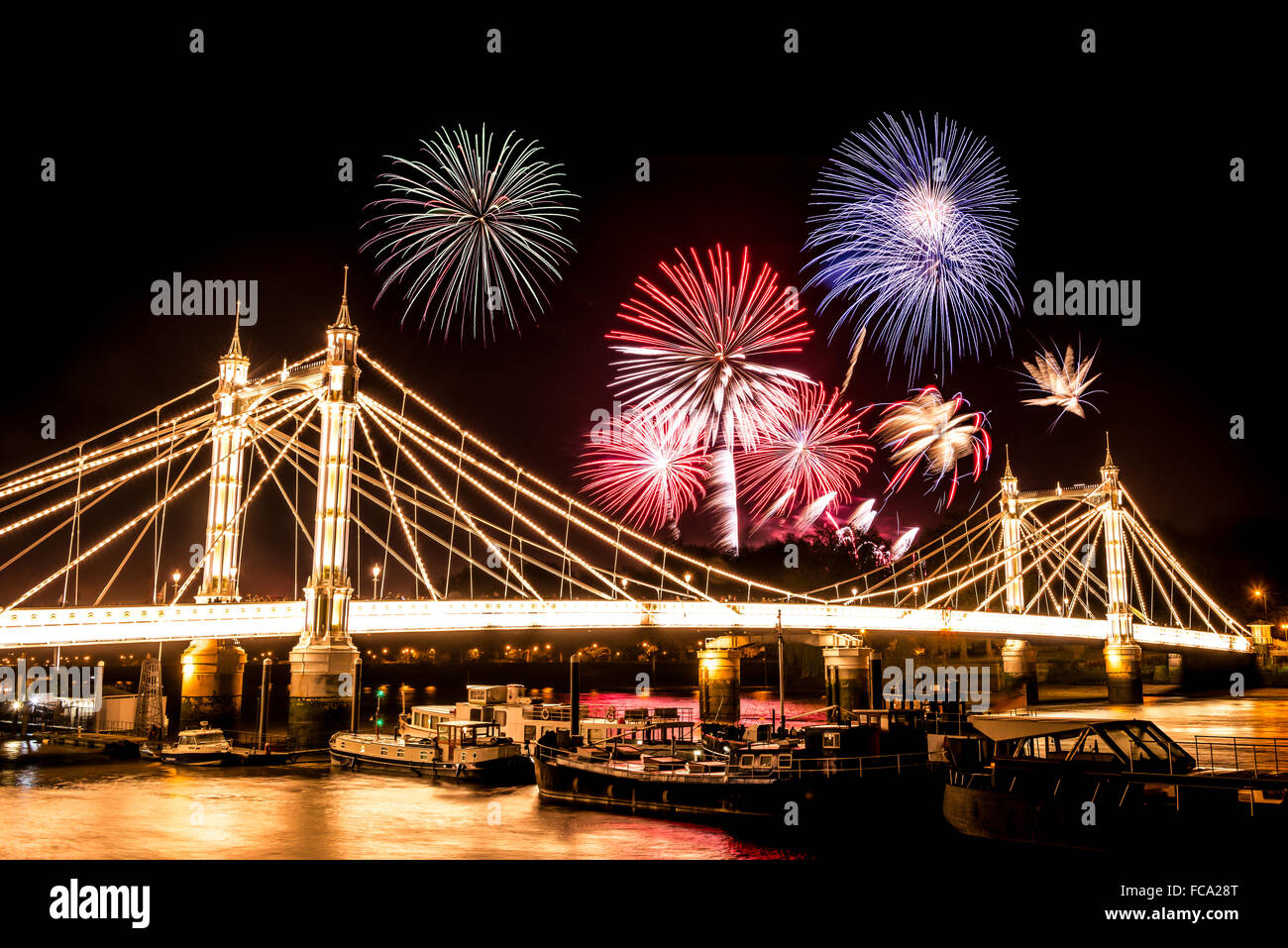 Fireworks behind Albert Bridge at Guy Fawkes night Stock Photo